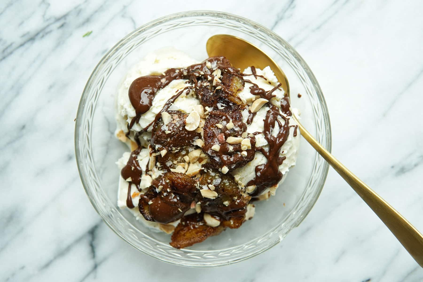 https://nataliecooks.com/wp-content/uploads/2023/05/Vanilla-Ice-Cream-with-Caramelized-Bananas-and-Chocolate-Peanut-Butter-Sauce.jpg