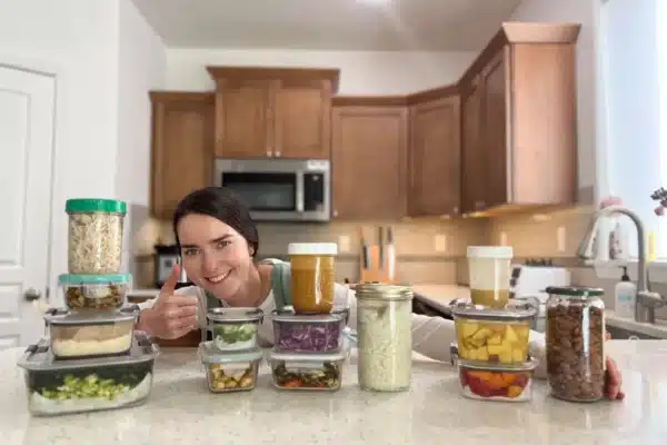 natalie smiling behind prepped food